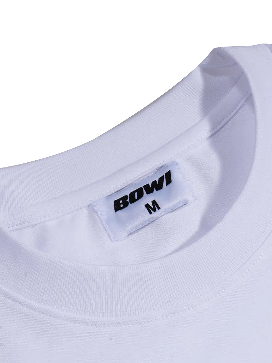Close-up of a white garment with a 'BOWI' label on a white background