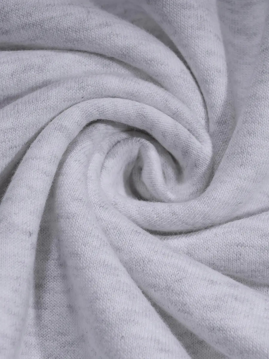 Close-up of gray fabric with folds Bowi Heavyweight Zip Up Hoodie in Athletic Heather Gray