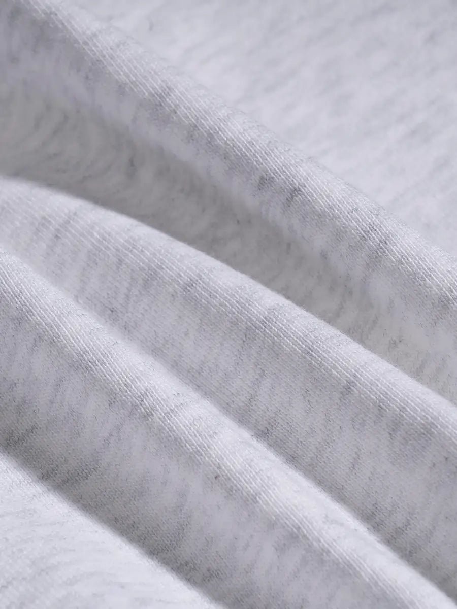 Close-up of gray fabric with a subtle pattern