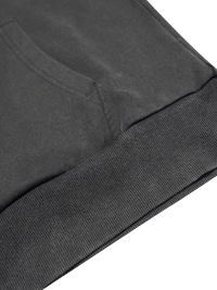 Close-up of a dark gray sweatshirt with ribbed cuffs on a white background