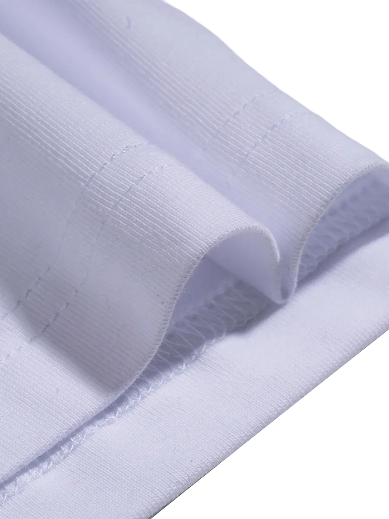Close-up of a textured white fabric roll on a white background