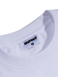 Close-up of a white garment with a 'BOWI' label on a white background