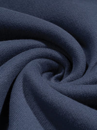 Close-up of dark blue fabric with visible texture