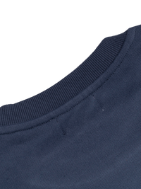 Close-up of a navy blue fabric texture on a white background