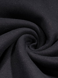 Close-up of dark fabric with folds
