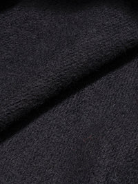 Close-up of dark textured fabric