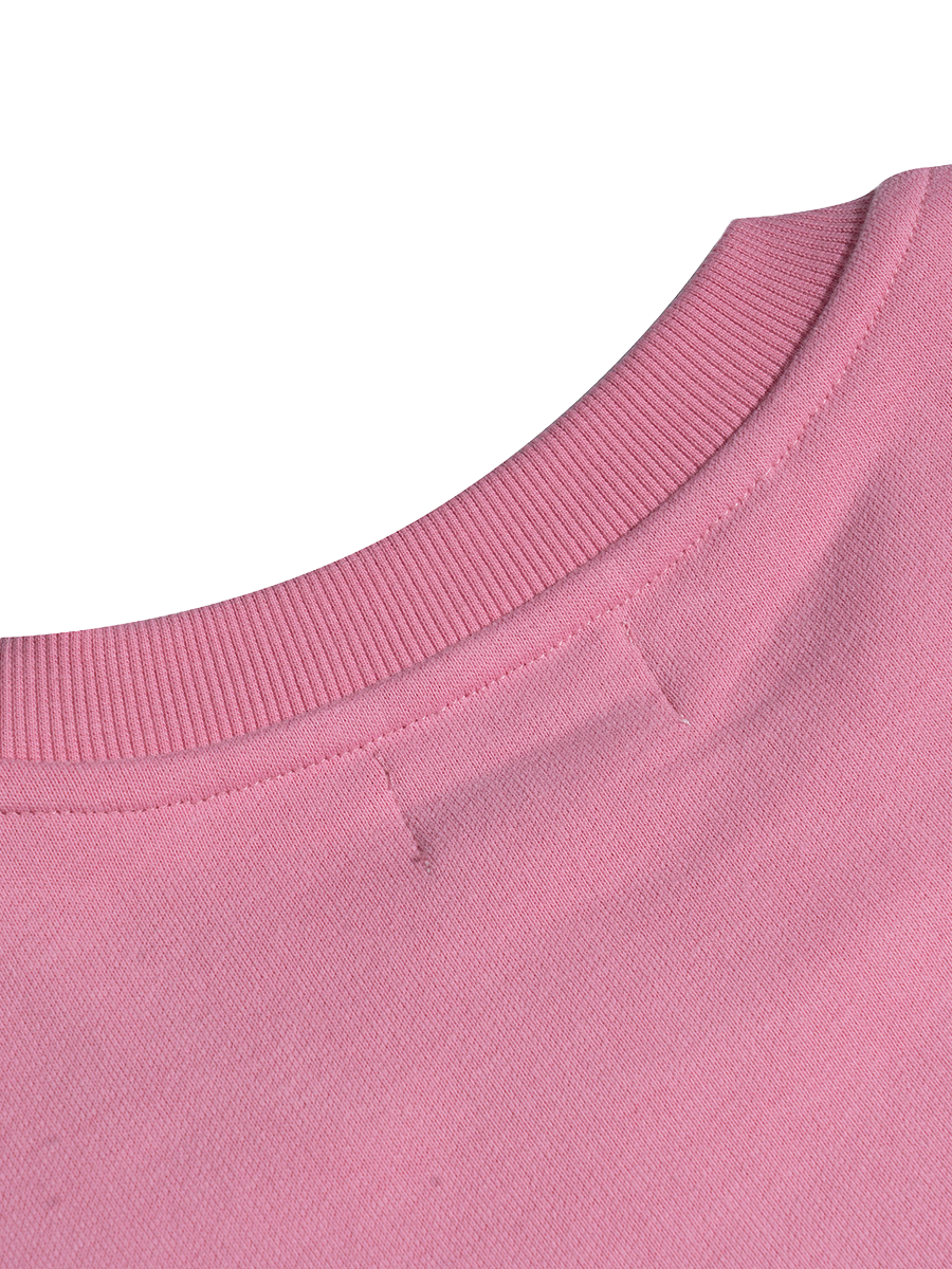 Close-up of a pink fabric texture on a white background