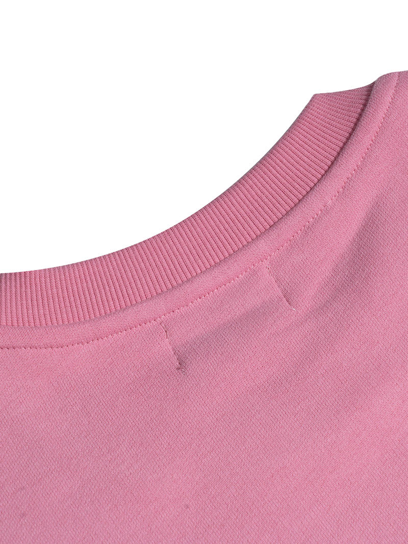 Close-up of a pink fabric texture on a white background