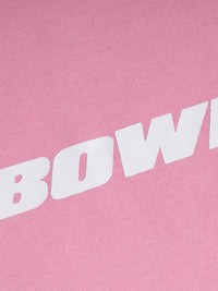 Pink fabric with 'BOWI' printed in white letters