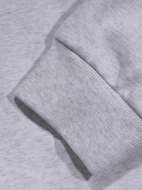 Close-up of a textured gray fabric with a focus on the material and texture.