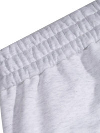 Close-up of gray sweatpants with a elastic waistband on a white background